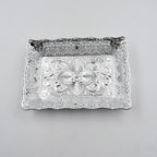 Decorative mukhwas serving tray beautifully arranged on a modern dining table.