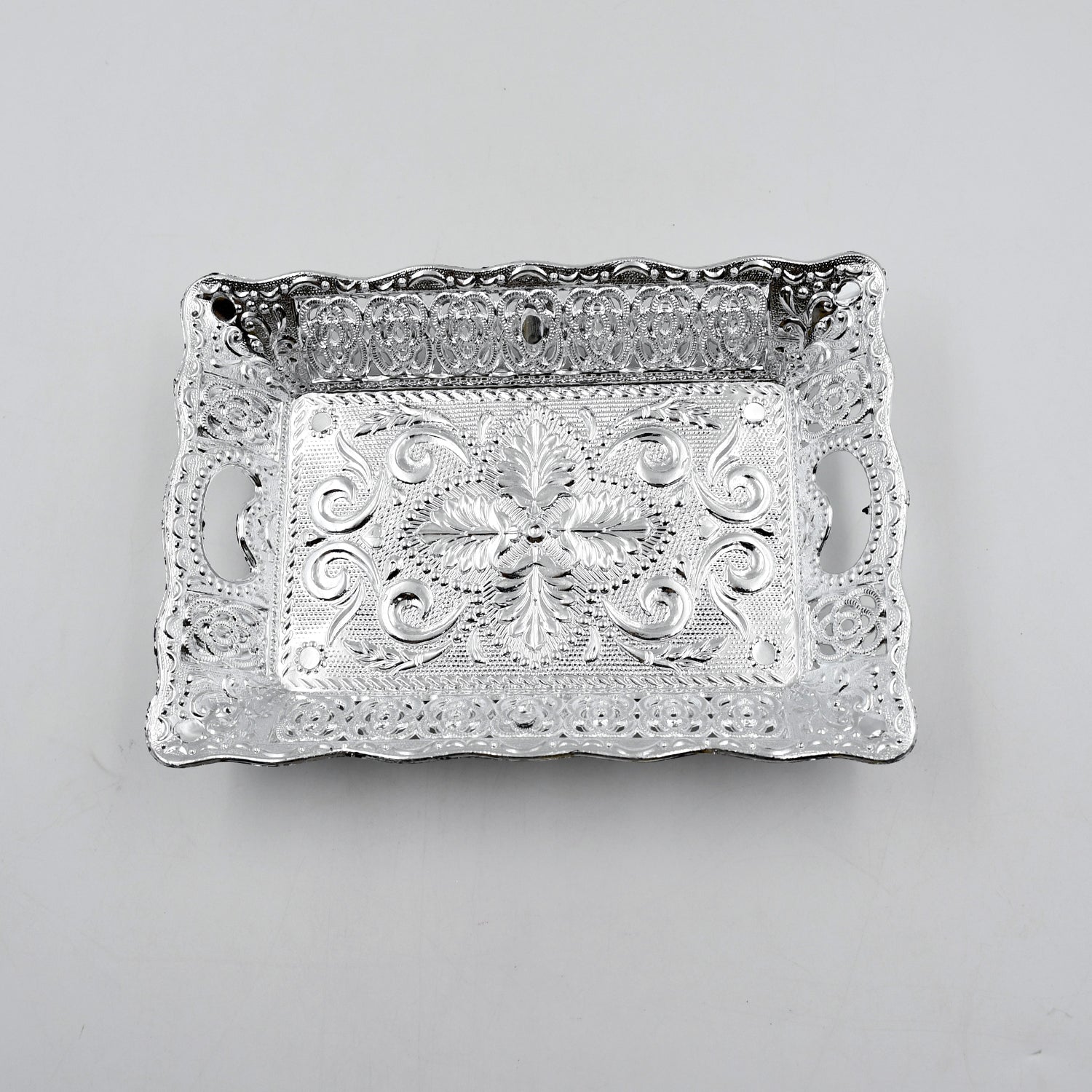 Decorative mukhwas serving tray beautifully arranged on a modern dining table.