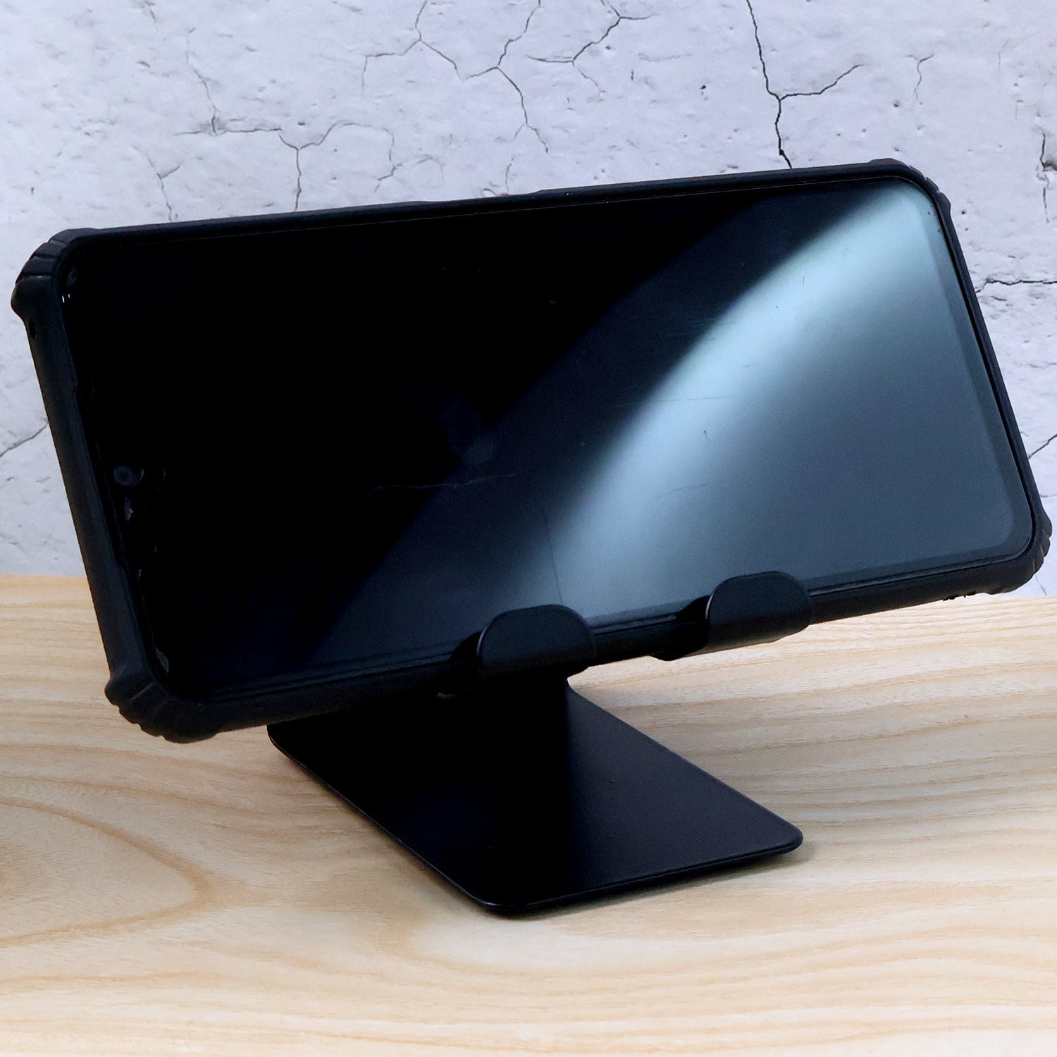 Triangular metal frame mobile stand designed for universal phone and tablet compatibility