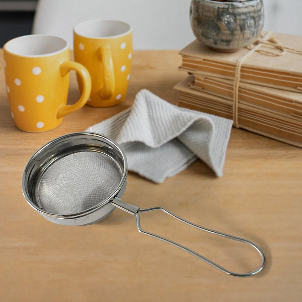 Stainless steel tea and coffee strainer displayed on white background