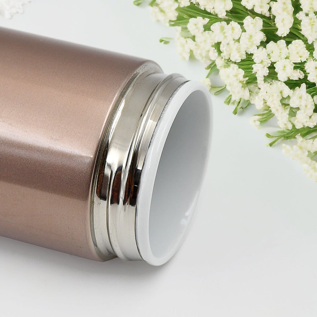 The vacuum insulated water bottle displayed from above, showing its wide mouth for easy cleaning.