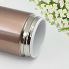 The vacuum insulated water bottle displayed from above, showing its wide mouth for easy cleaning.