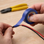 Compact electrical insulation tape roll in toolbox