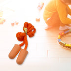 Multiple pairs of soft foam earplugs ready for use.