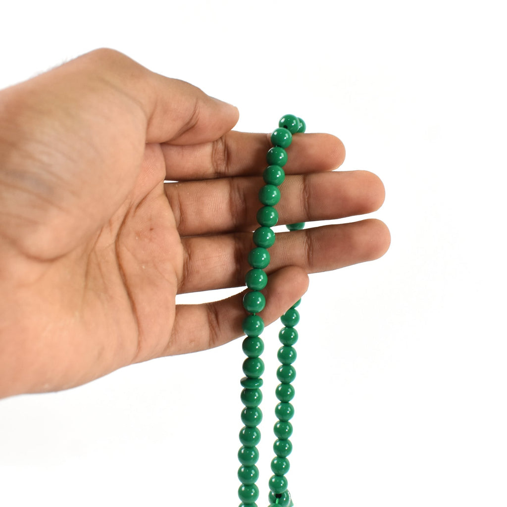 Focused view of Islamic rosary beads, showcasing their smooth finish.