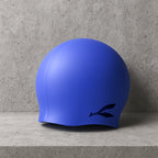 Silicone swimming cap stretching smoothly over a swimmer’s head to show its anti-slip fit