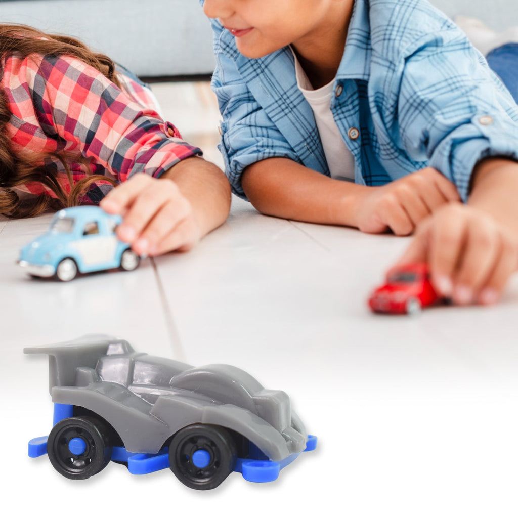 Children's pull back vehicle toys, ready for play, showcasing their compact size.