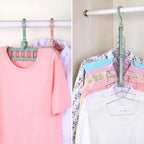 Wardrobe Organizer Hanger holding multiple garments, demonstrating vertical and horizontal use.