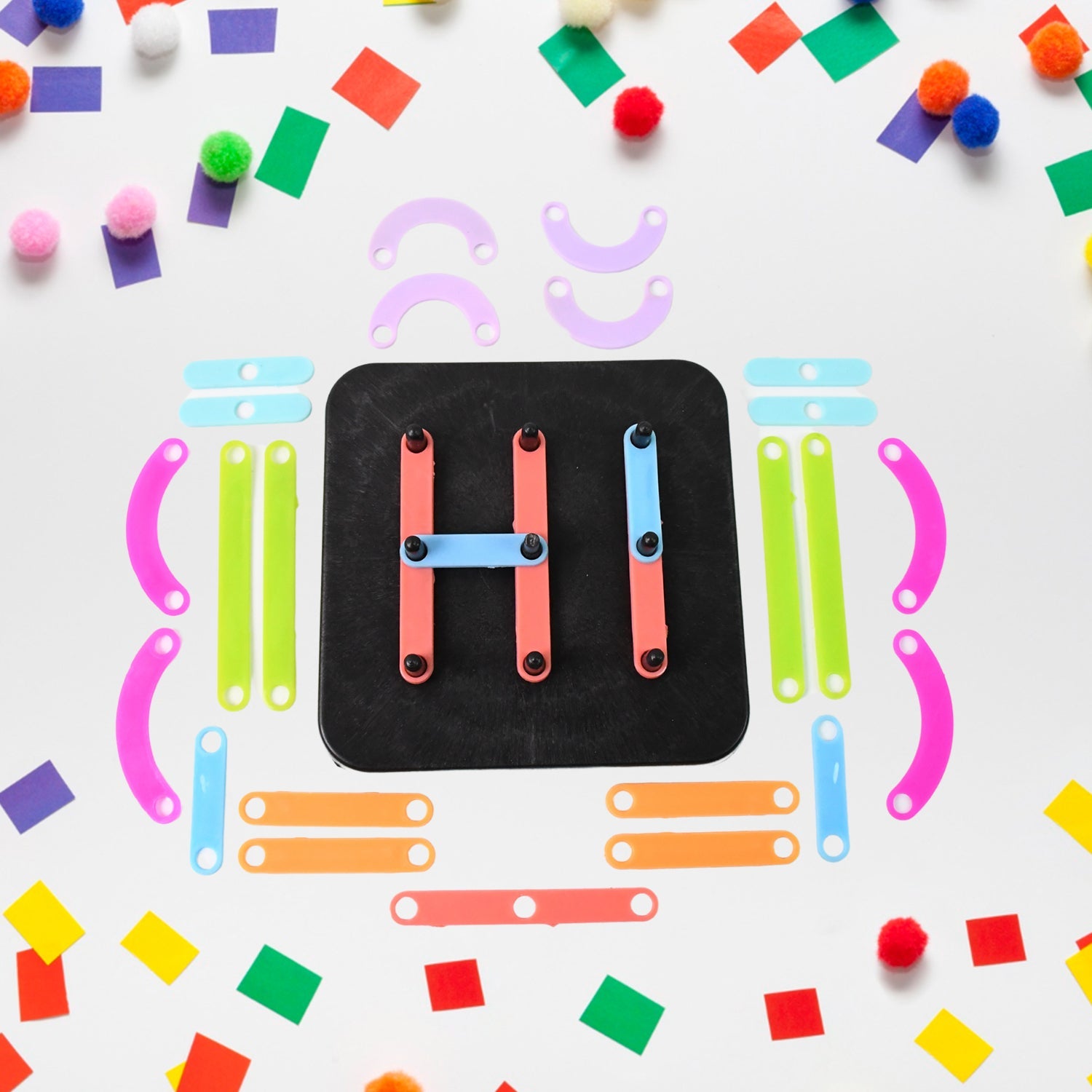 Assortment of colourful educational toy pieces for creative learning.