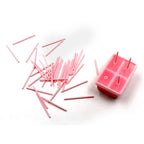 Flexible silicone ice molds filled with water, ready for freezing on a kitchen counter.