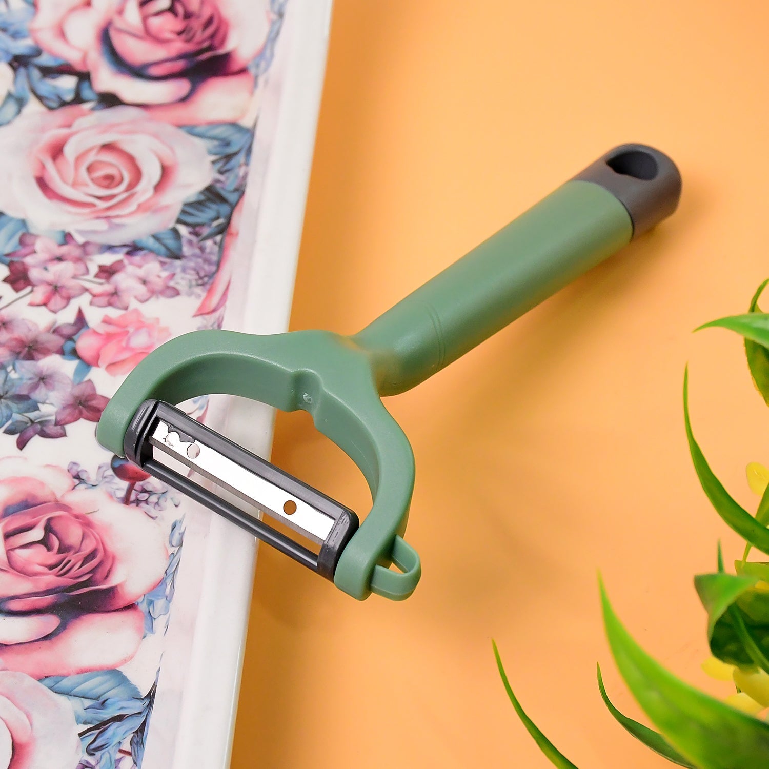 Apex Premium ergonomic fruit and vegetable peeler showing sharp blade