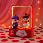 Decorative LED figurine light showcasing couple in love theme
