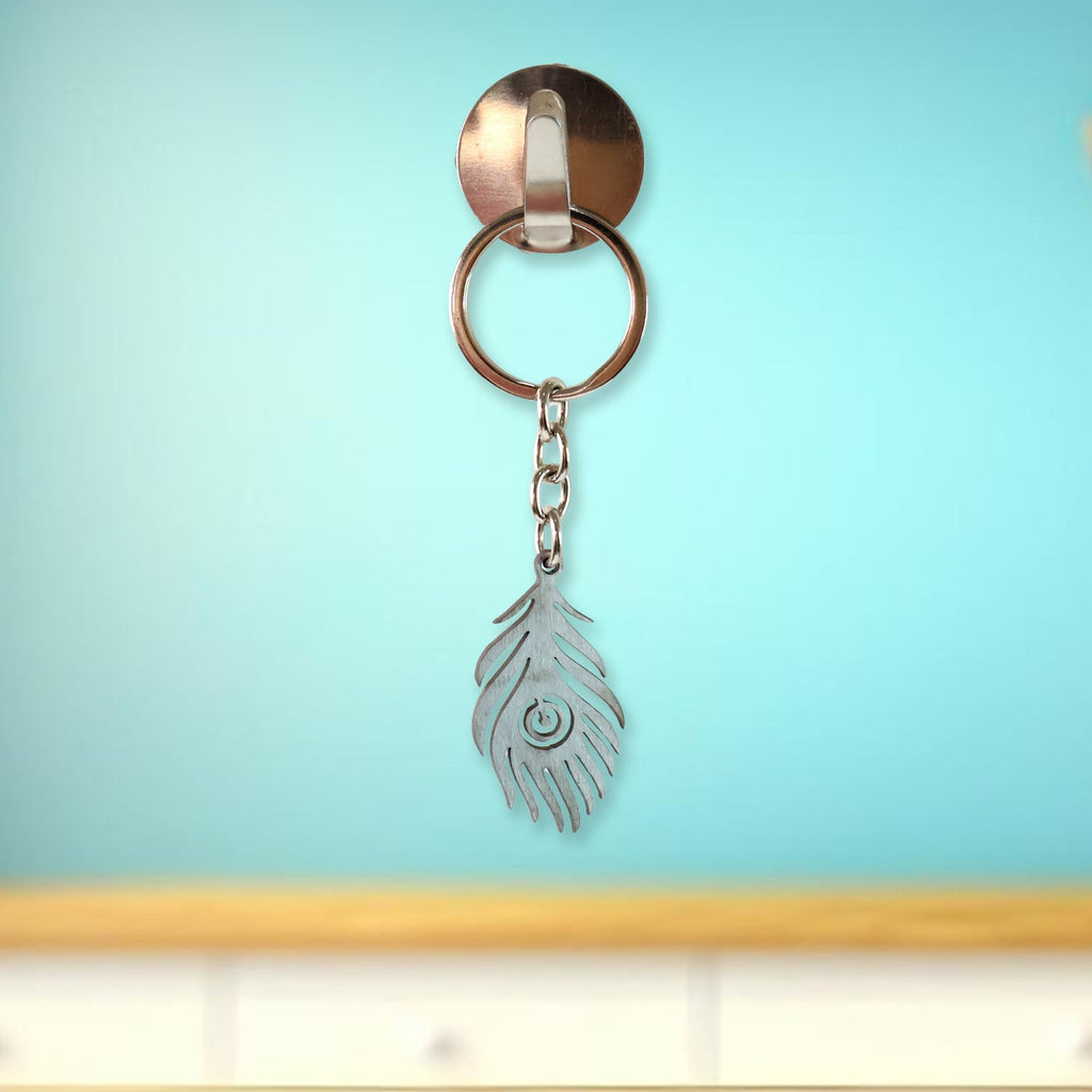 Elegant laser-cut peacock feather keychain accessory