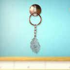 Elegant laser-cut peacock feather keychain accessory