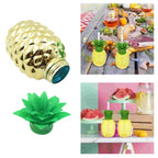 Decorative pineapple cup with straw amidst other colorful party decorations.