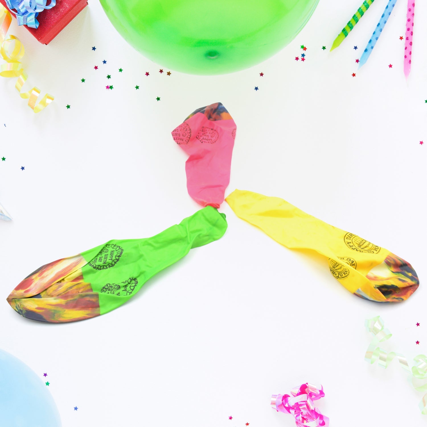 A bunch of cheerful multicolor balloons tied together for a birthday party.