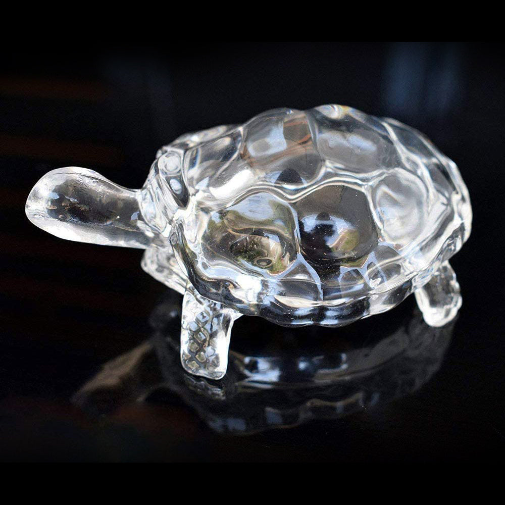 Clear crystal turtle statue for Feng Shui and Vastu, bringing positive energy.