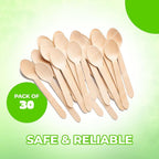 Disposable wooden spoons laid out neatly, prepared for catering use.