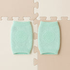 Close-up of soft mint green wool toddler knee protector leg warmers