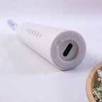 Close detail of ergonomic handle on rechargeable electric toothbrush