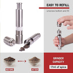 Side view of the modern stainless steel thumb press spice grinder.