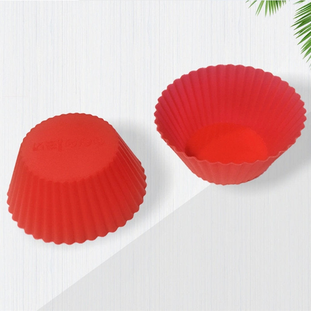 Brightly colored silicone cupcake mould, flexible and durable for baking.