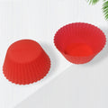 Brightly colored silicone cupcake mould, flexible and durable for baking.