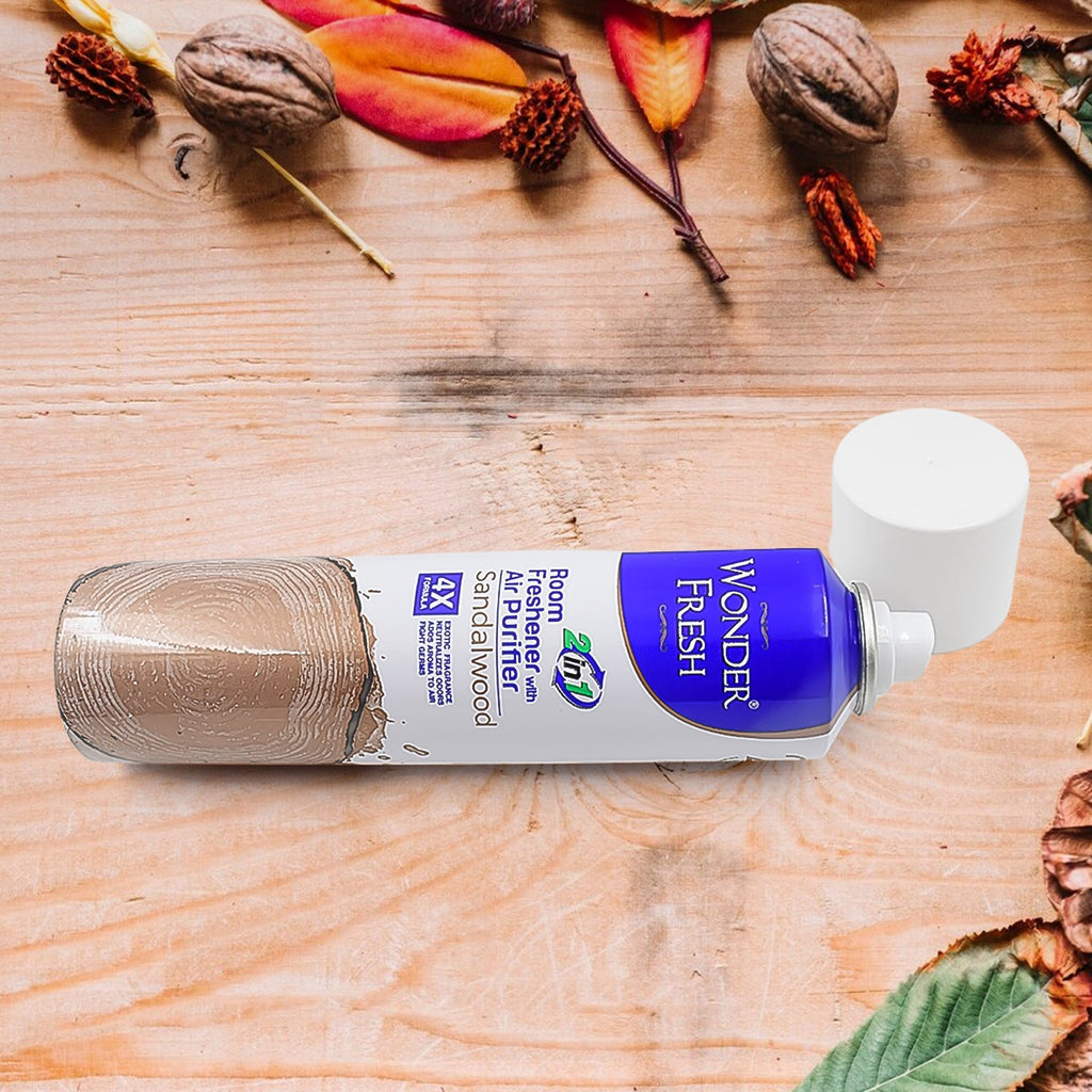 Sandalwood Air Freshener spray bottle with a warm, golden wooden background.