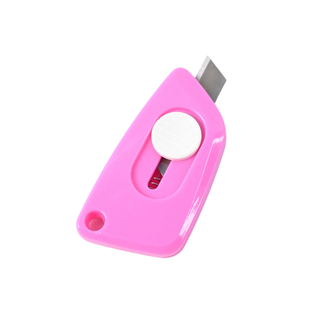 Mini Cloud Cutter utility knife next to packaging illustrating compact size