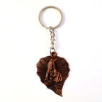 Close view of peepal leaf charm on Bal Krishna keychain