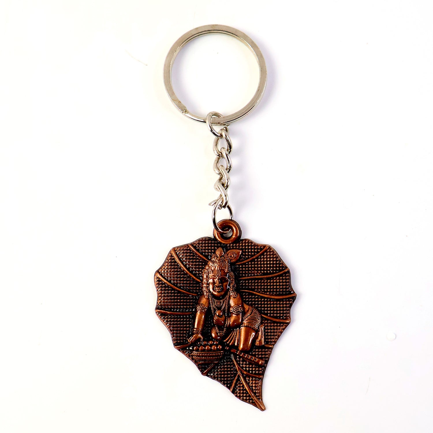 Close view of peepal leaf charm on Bal Krishna keychain
