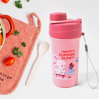 Overhead view of the complete lunch box set, including the reusable food container, bottle, and fork.
