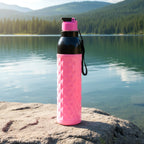 Water bottle equipped with convenient carry strap for travel