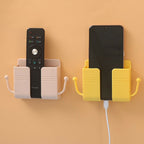 Versatile wallmount mobile stand securely holding a phone and small accessories.