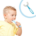Comfortable U-shaped toothbrush in blue, perfect for little hands to grip.