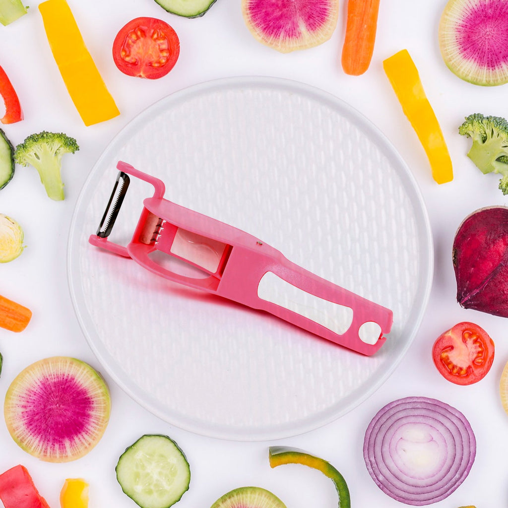 Detailed view of the Y-shaped peeler, perfect for various fruits and vegetables.
