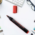Red ink marker with bold tip for industrial and office use
