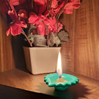 Multiple colourful silicone diyas glowing warmly in a beautiful festive arrangement.