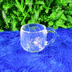 Elegant glass mugs and tumblers from the 4-piece drinkware set, ready for use.