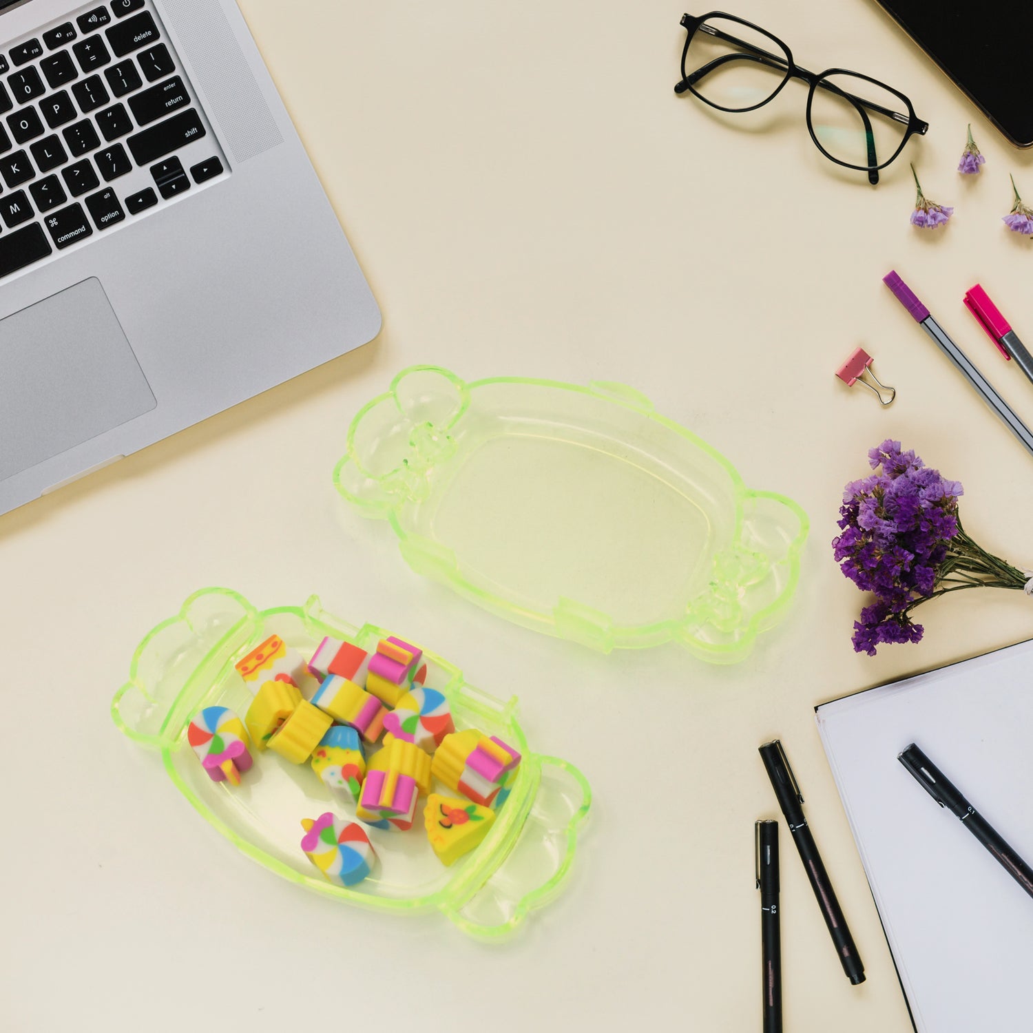 Compact set of 15 cute rubber erasers, easy to carry for students.