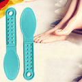 Ergonomic plastic foot scrubber with a textured surface for effective pedicure.