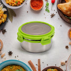 Round stainless steel lunch box with secure lid, ideal for daily use.