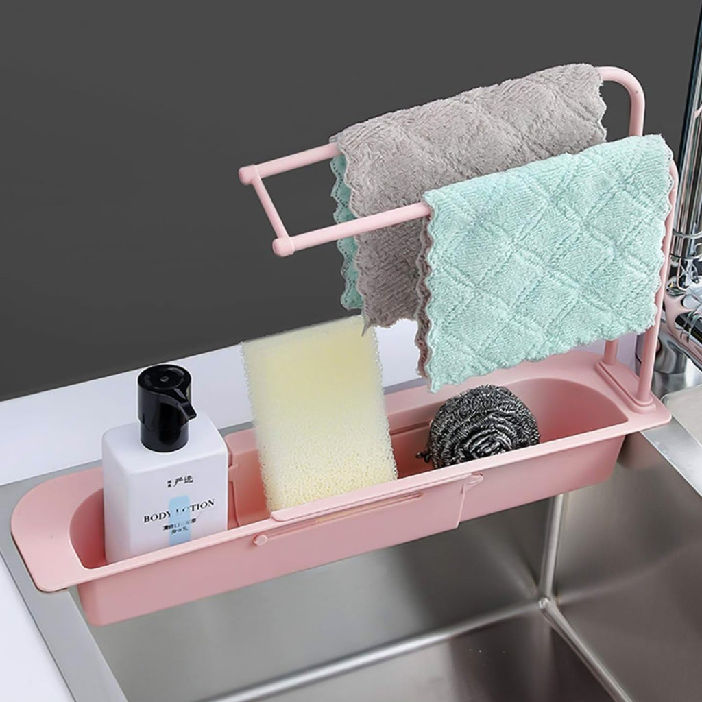 Adjustable over-sink caddy fitted securely on a kitchen sink holding kitchen tools