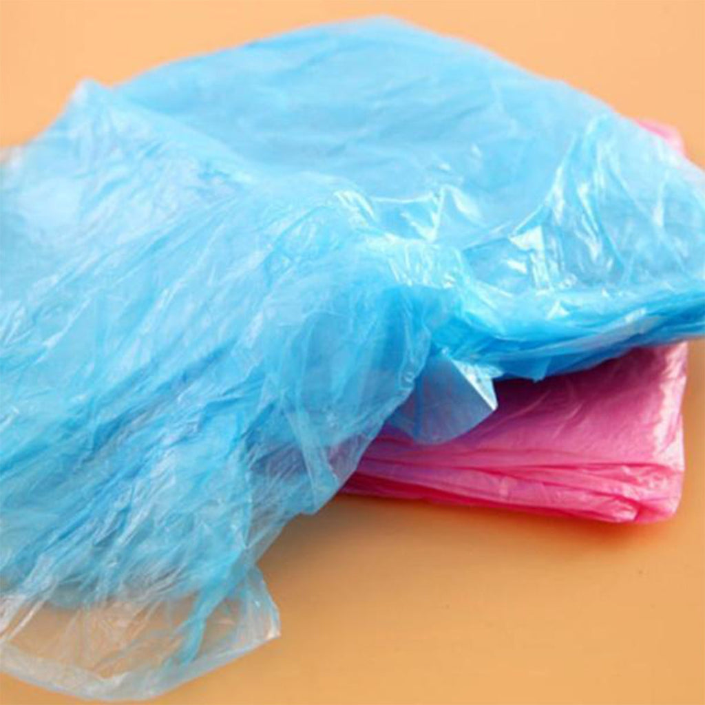 Travel-friendly disposable raincoat in compact packaging, easy to carry.