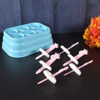 Frozen giraffe-shaped popsicles made using plastic molds