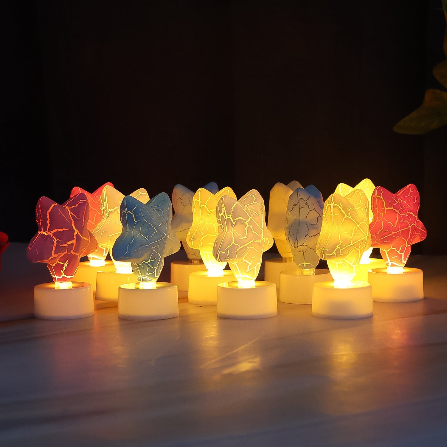 Unlit star shaped LED tealight candle with plastic body decorative topper