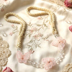 Elegant beaded drapery tieback enhancing curtain beauty