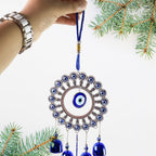 Blue metallic bells on Om Evil Eye decorative wind chime