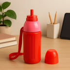 Blue insulated water bottle 500ml standing upright, showing the attached carry strap.