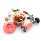Close-up of the 800ml push chopper's durable stainless steel blade mechanism.